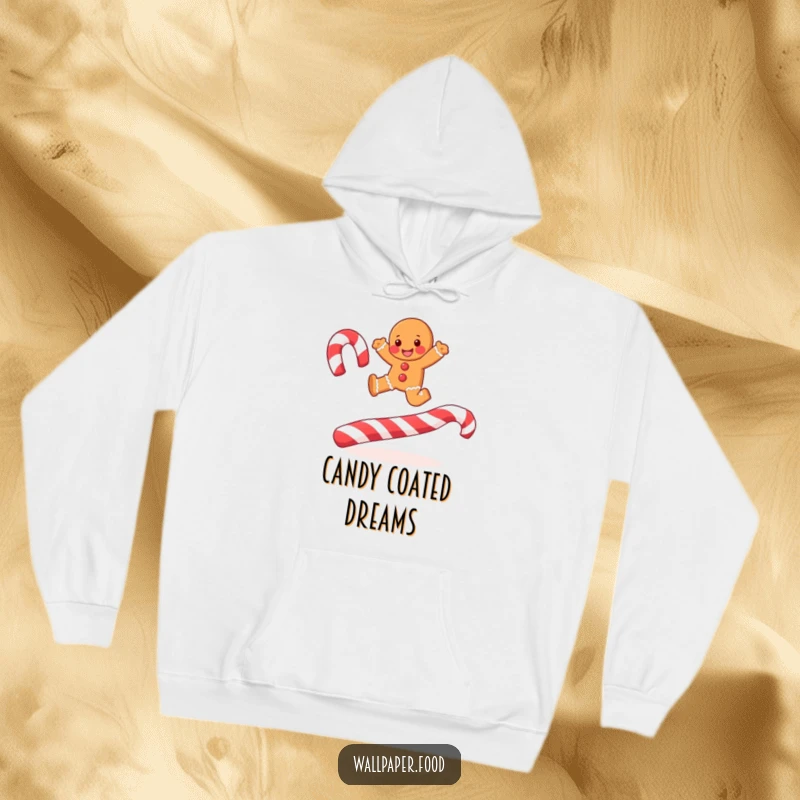 Comfortable hoodie featuring a joyful gingerbread man leaping over candy cane stripes, perfect for cozy holiday fun.