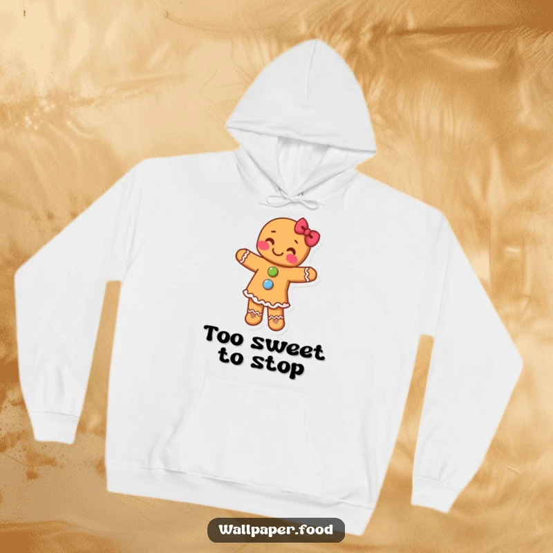 Funny hoodie featuring a gingerbread person with candy buttons dancing energetically, radiating holiday happiness and fun.